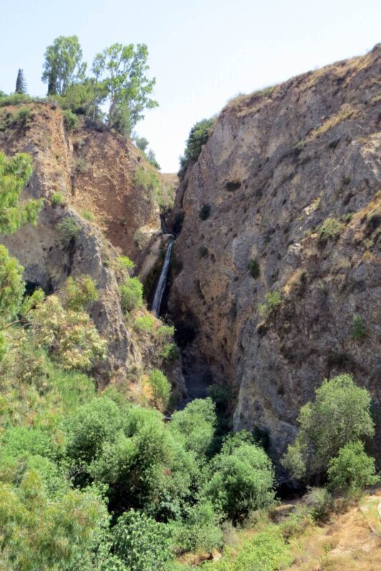 The waterfall peeks out from the lookout