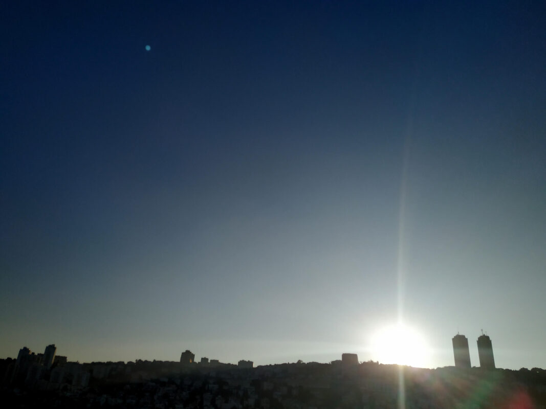 Panoramic sunset behind Dan Panorama