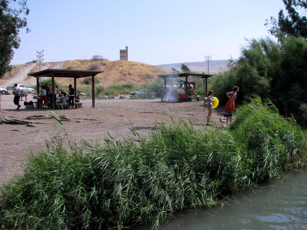 The Three Lookout reflected above the hill